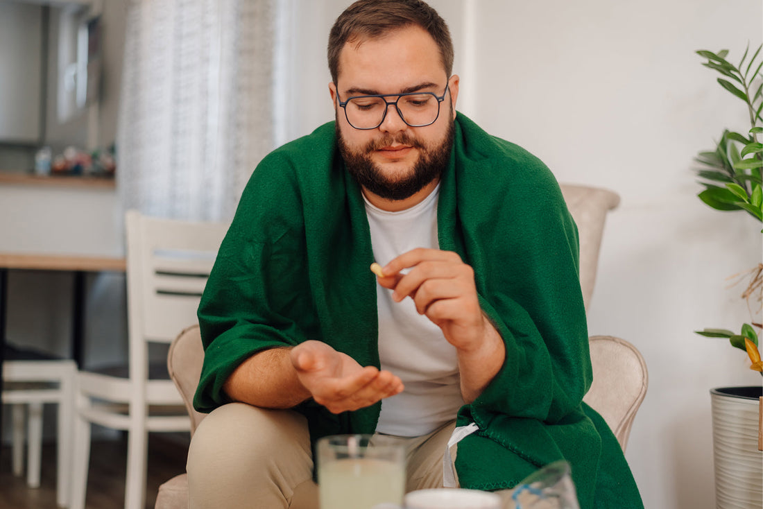 A man taking a vitamin